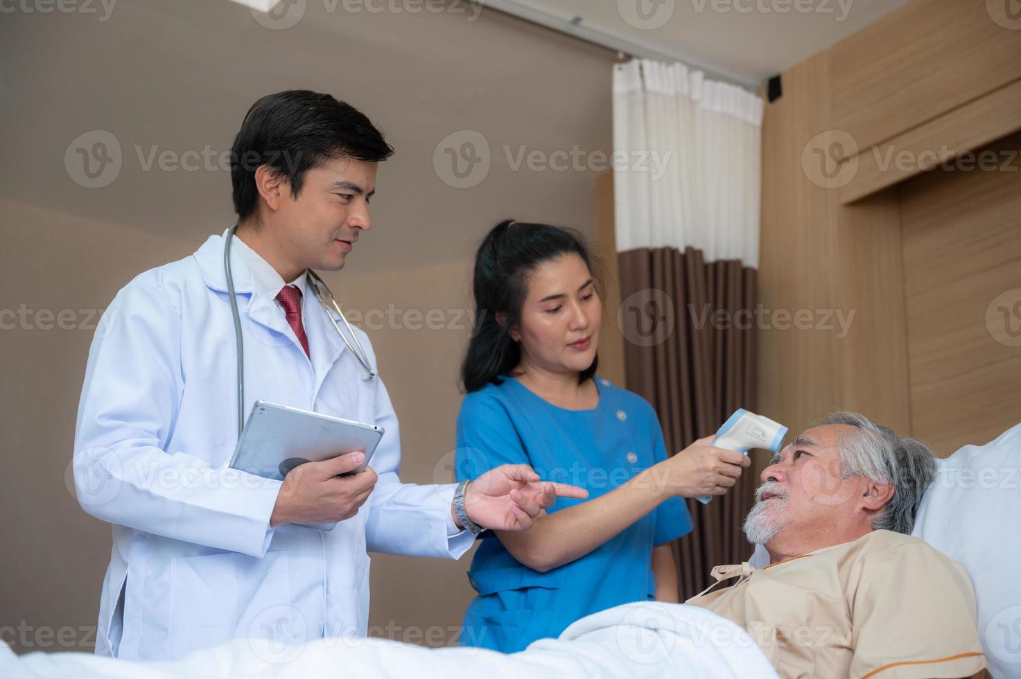 senior elderly patient person visit doctor for health care checkup at hospital, health insurance medical care concept, old man having disease and making medicine help support by nurse at clinic photo