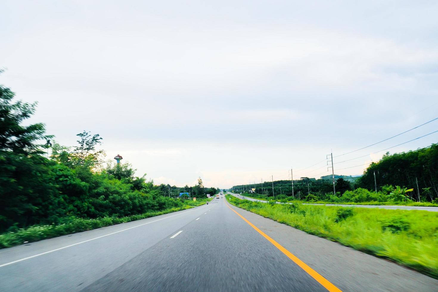 View of Road No. 4 in the south of Thailand in view of a speeding car. travel concept photo