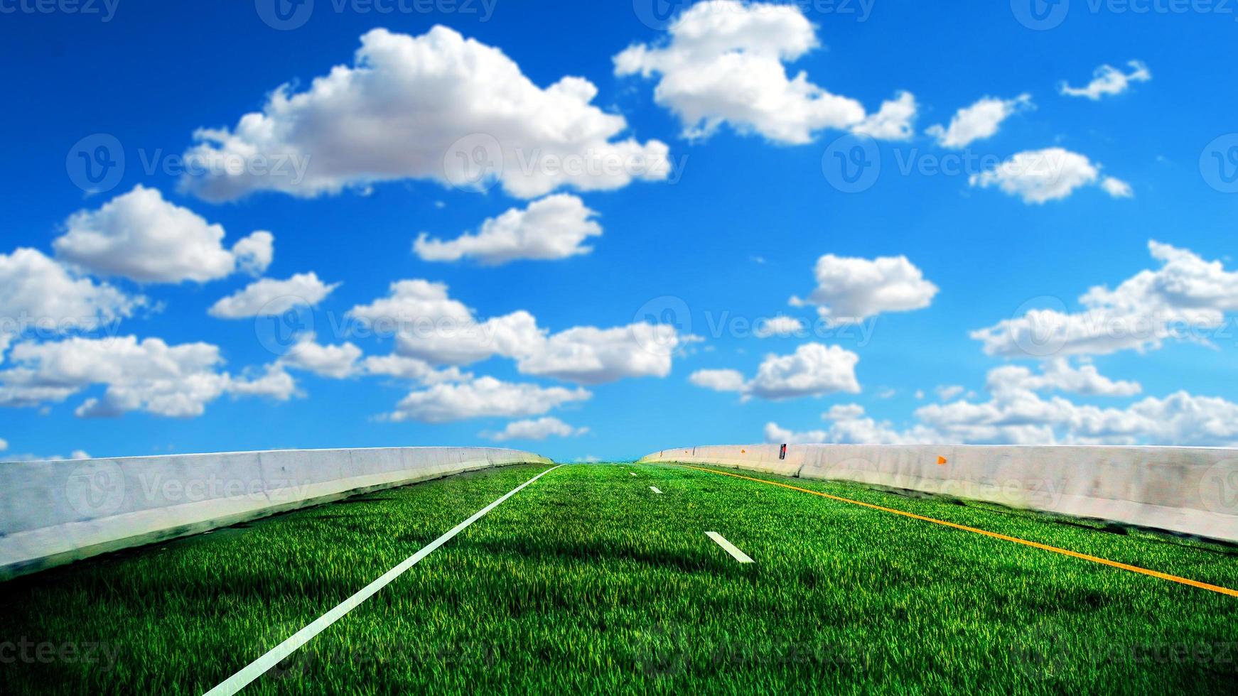 Green road concept without pollution. The road is made of grass on a bright day. photo