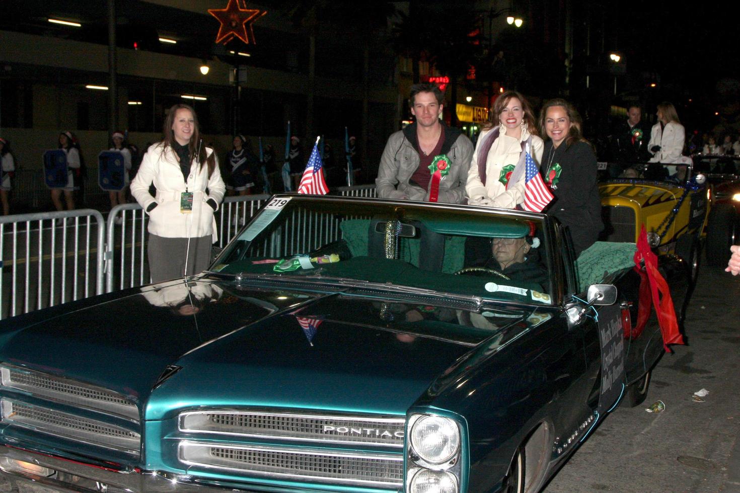 LOS ANGELES, NOV 28 -  Mark Hapka, Moly Burnett, Chrystal Chappell arrives at the 2010 Hollywood Christmas Parade at Hollywood Boulevard on November 28, 2010 in Los Angeles, CA photo