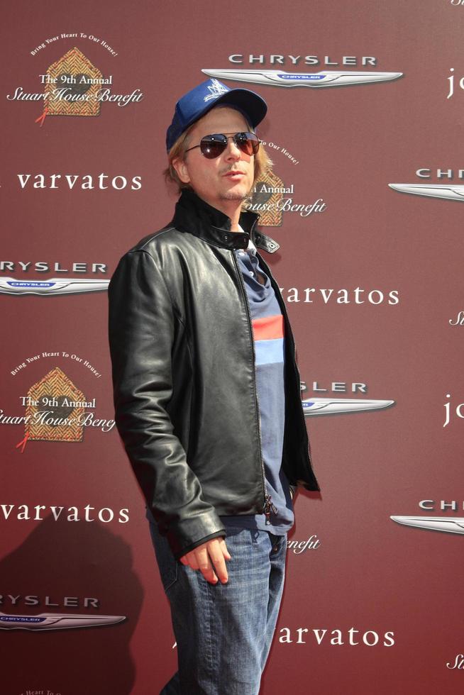 LOS ANGELES, MAR 11 -  David Spade arrives at the 9th Annual John Varvatos Stuart House Benefit at the John Varvatos Store on March 11, 2012 in West Hollywood, CA photo