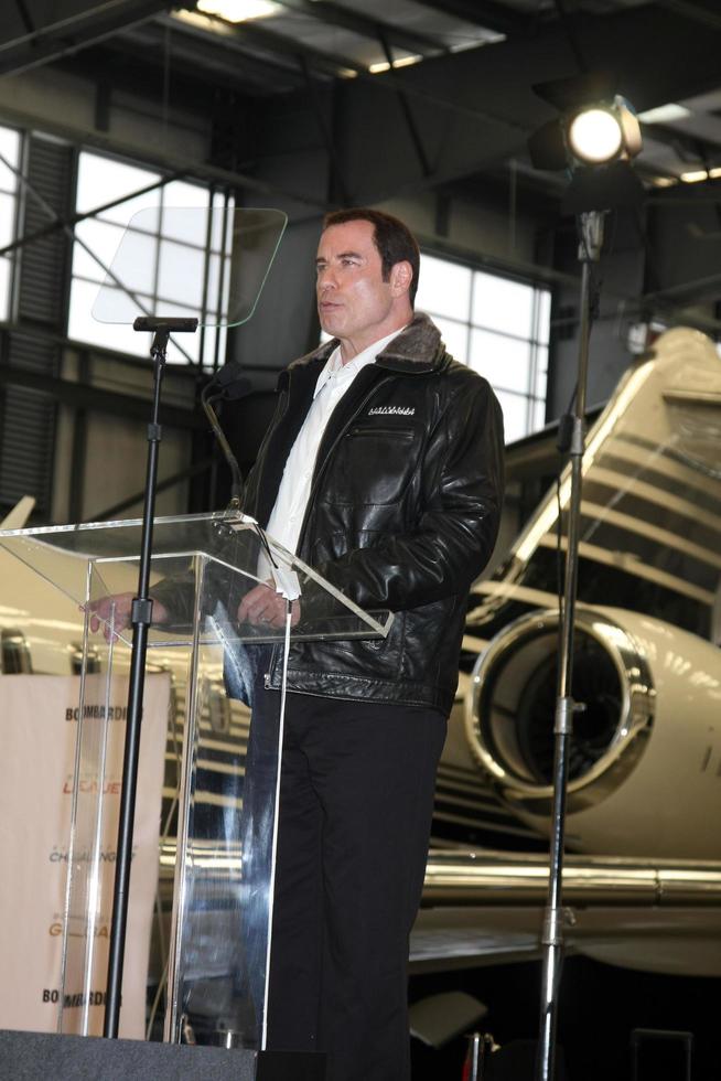 LOS ANGELES, SEP 20 -  John Travolta at the Bombardier Aircraft Event announcing John Travolta as the Spokesperson for Bombardier at Hanger 25, Burbank Airport on September 20, 2011 in Burbank, CA photo