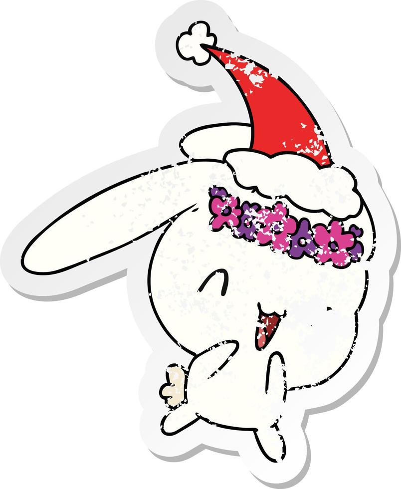 christmas distressed sticker cartoon of kawaii rabbit vector