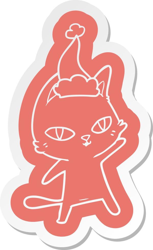 cartoon  sticker of a cat staring wearing santa hat vector