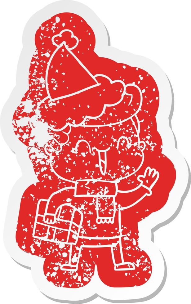 cartoon distressed sticker of a laughing boy wearing santa hat vector