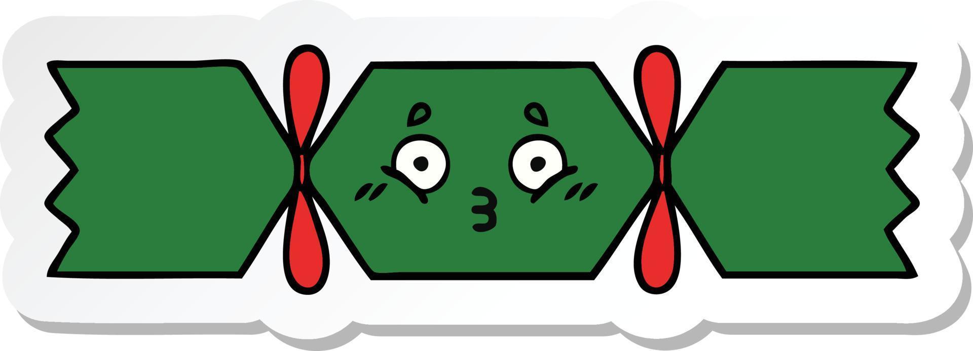 sticker of a cute cartoon christmas cracker vector