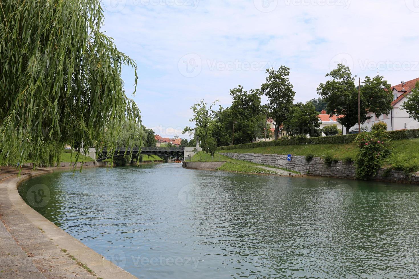 The Ljubljanica River flows through the capital of Slovenia, the city of Ljubljana. photo