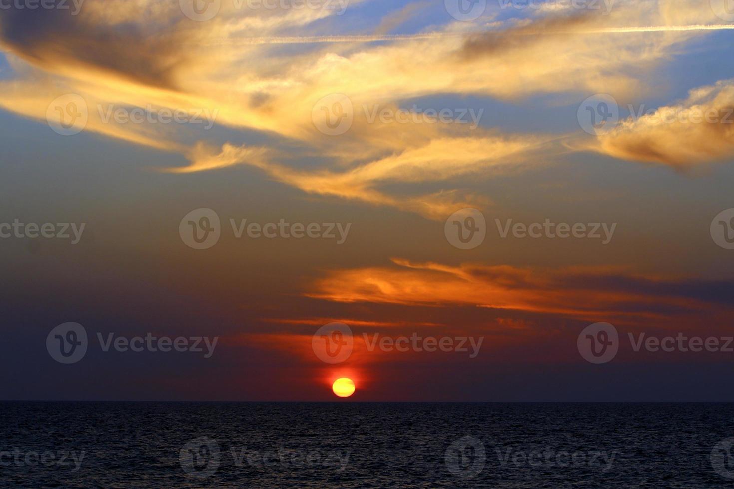 Colorful sunset at the end of the day. photo