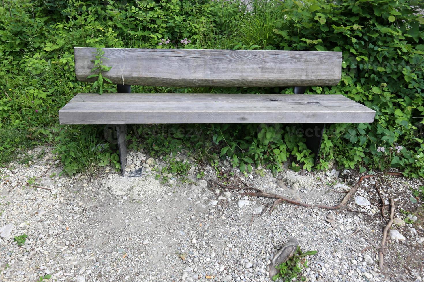 Bench for rest in a city park on the shores of the Mediterranean Sea. photo