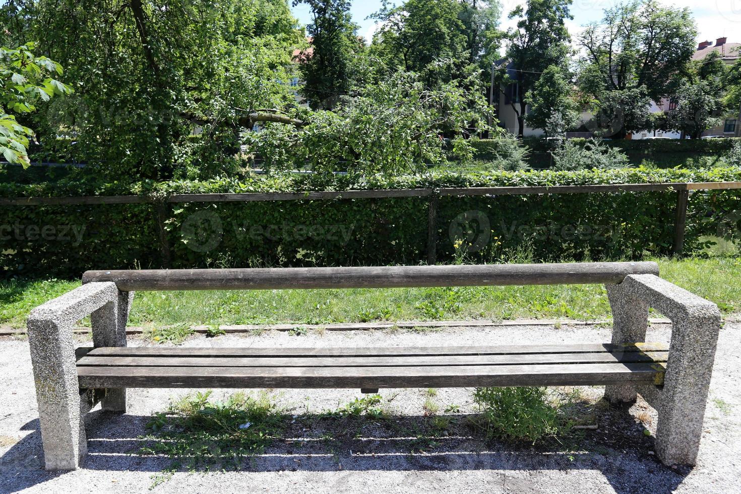 Bench for rest in a city park on the shores of the Mediterranean Sea. photo