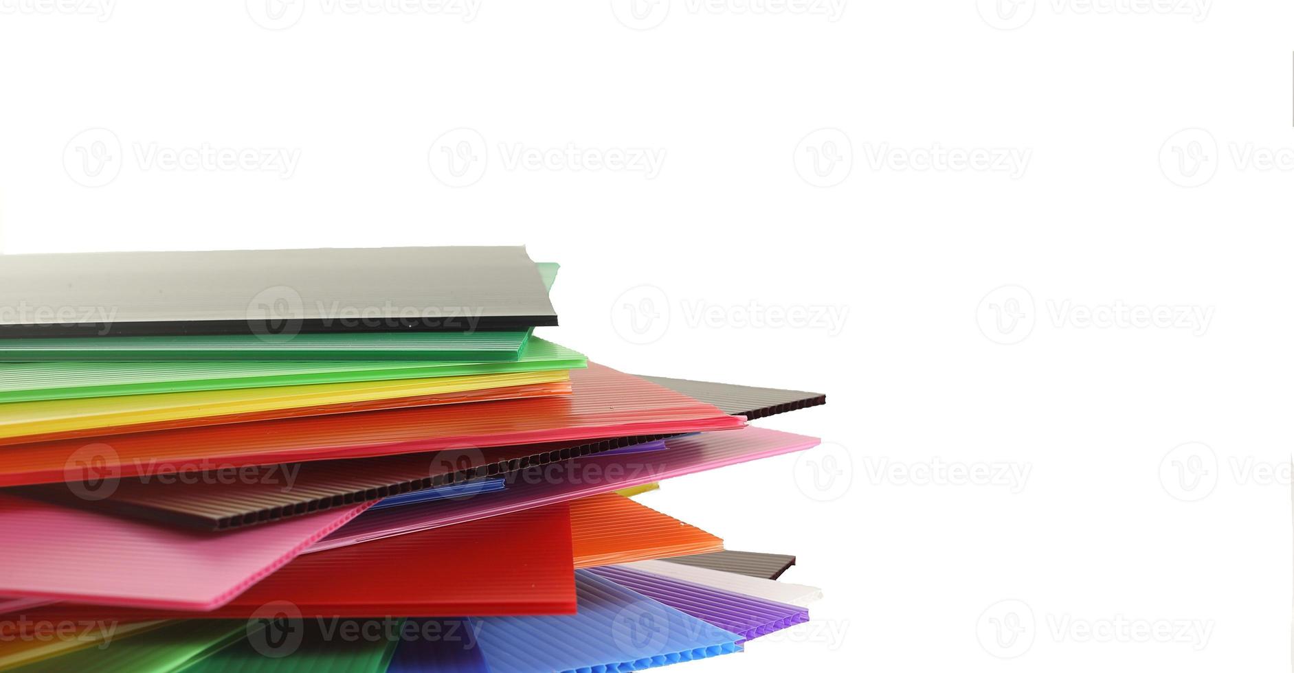 Group of corrugated plastic sheets on white photo