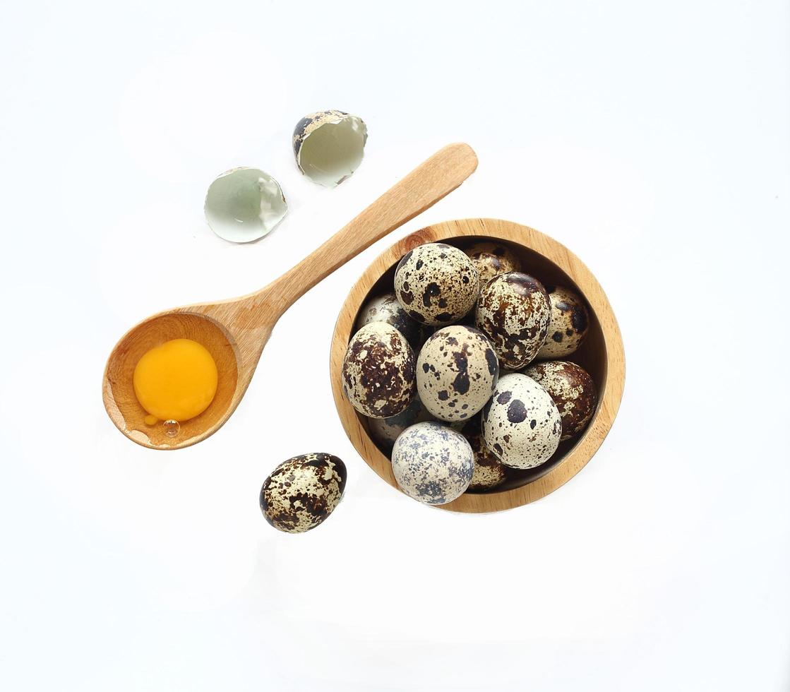 Top view of quail eggs isolated on white photo