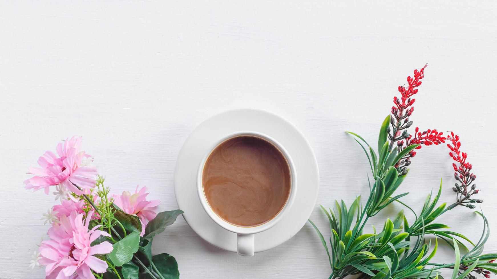 Flat lay relax coffee cup  on white wooden background photo