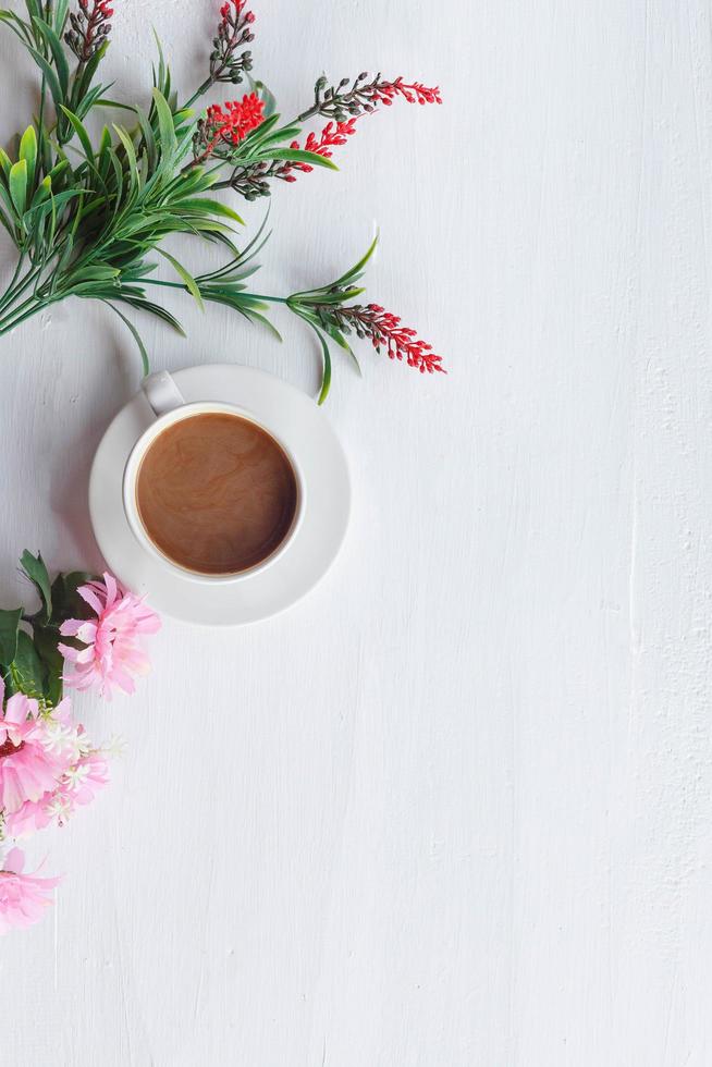 Flat lay relax coffee cup  on white wooden background photo