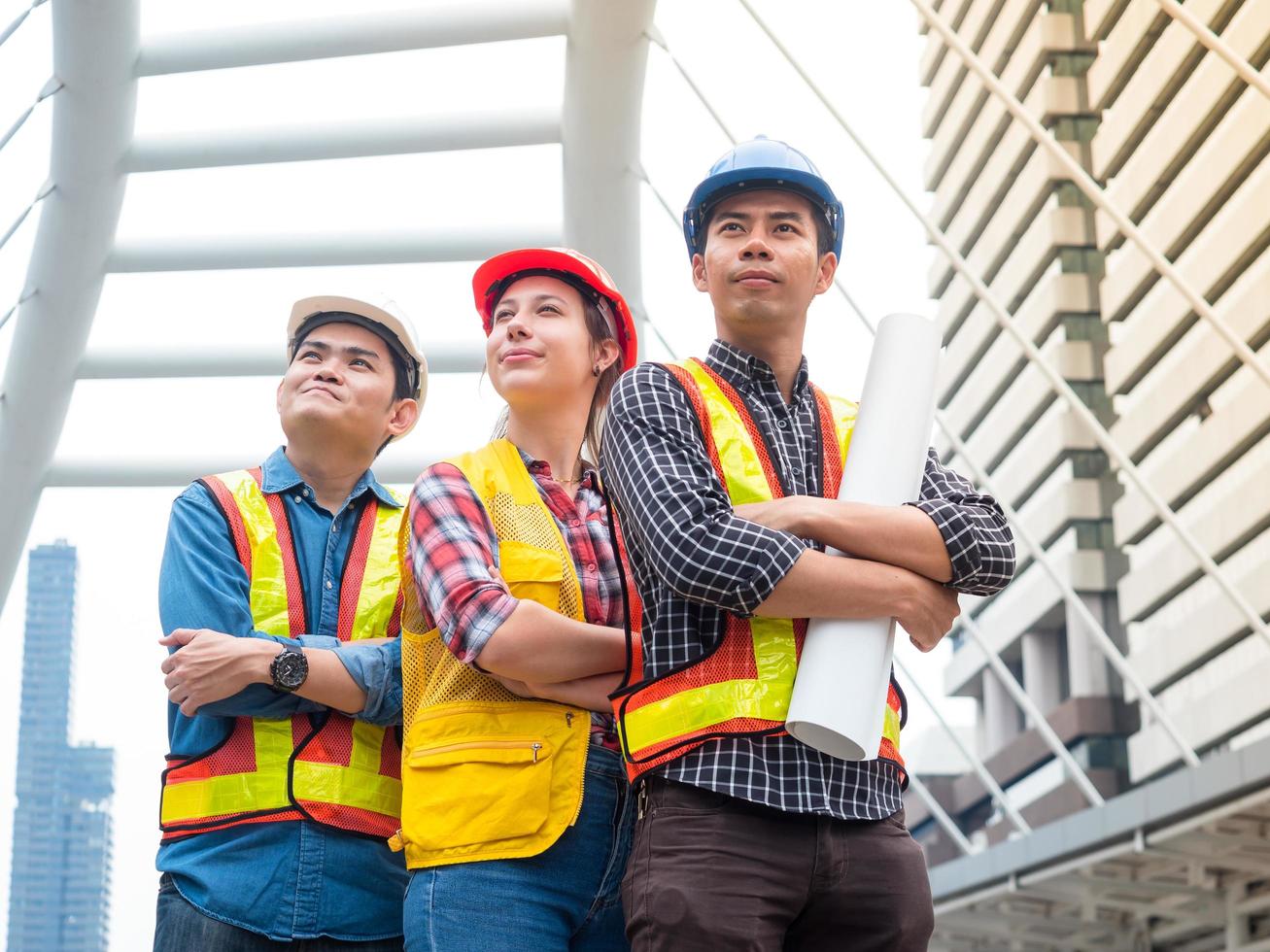 Group of engineer team action and happy after discussion with their project work photo