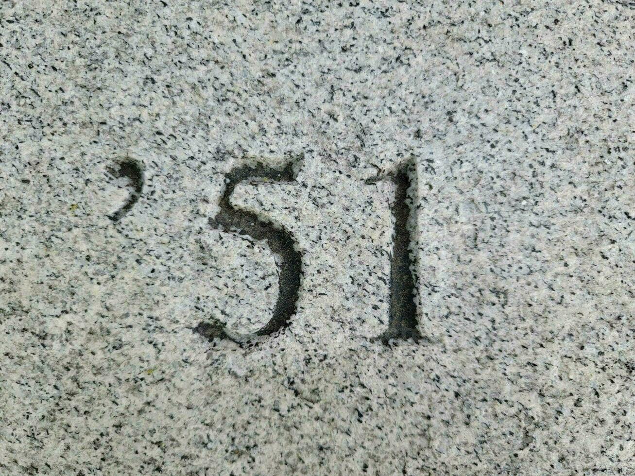 the number 51 or year engraved or etched on marble photo