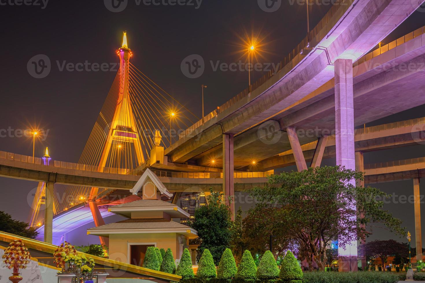 Light up on the Bhumibol highway bridge with the garden in the Lat Pho park, Samut Prakan, Thailand photo