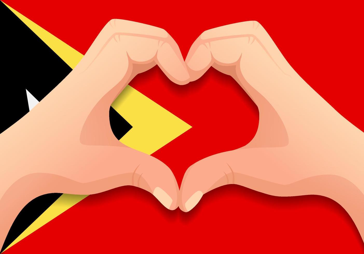 bandera de timor oriental y forma de corazón de mano vector