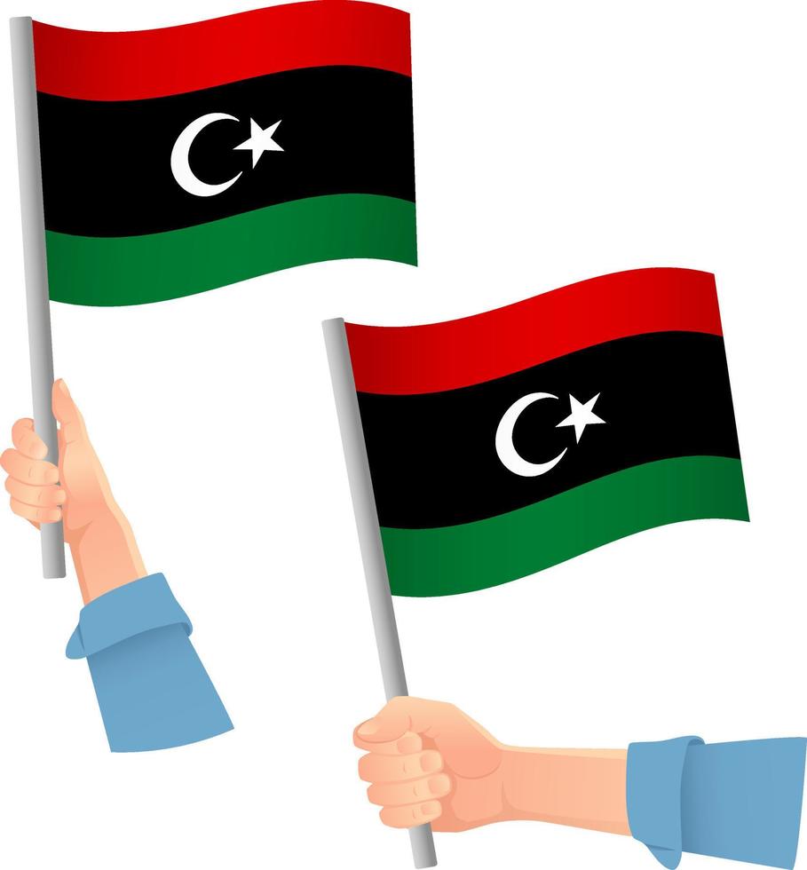 icono de la bandera de libia en la mano vector