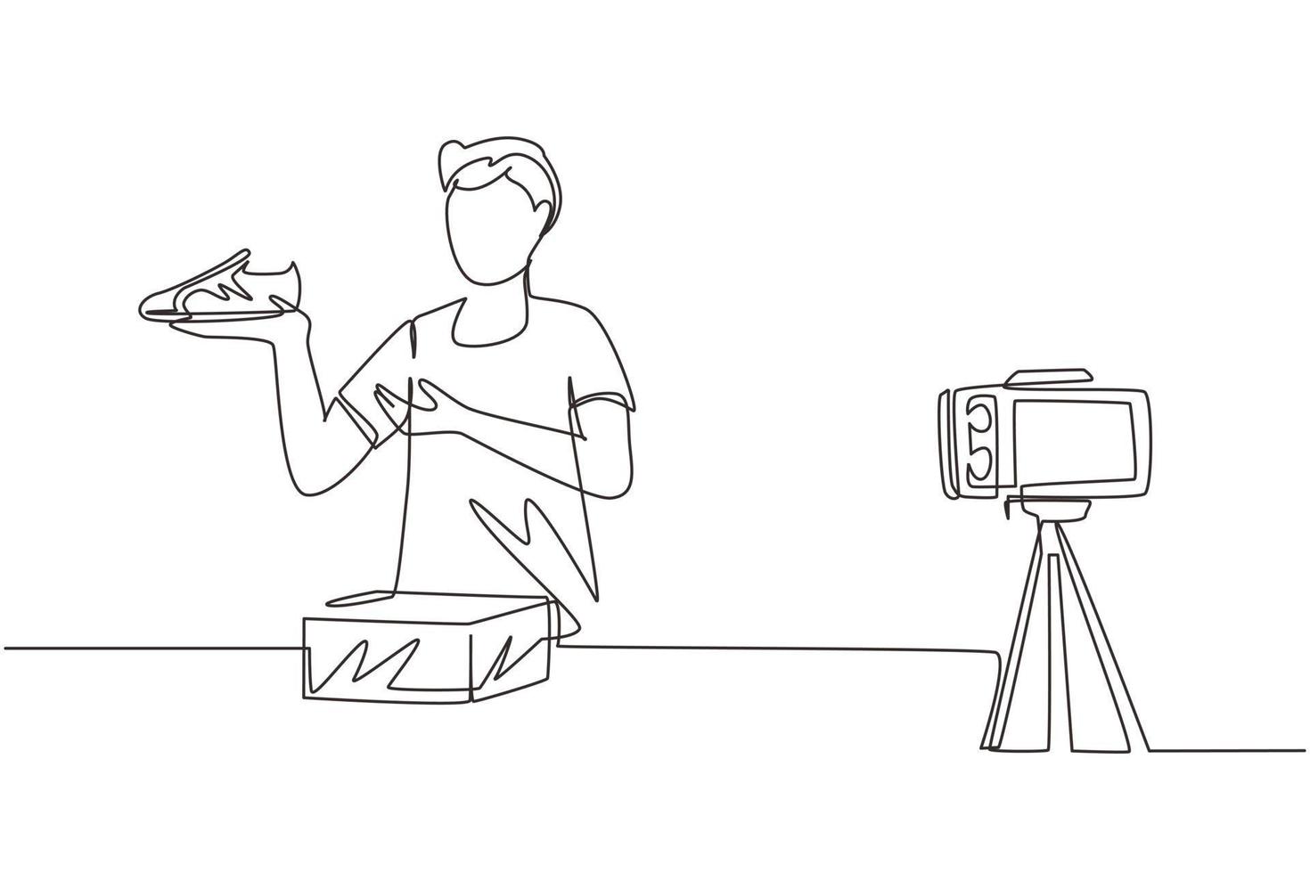 Single one line drawing male blogger makes video review on camera on topic of sneakers. Online shopping, social media and influencer concept. Continuous line draw design graphic vector illustration