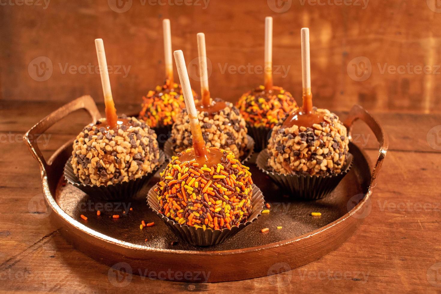 Fall colored candy caramel apples photo