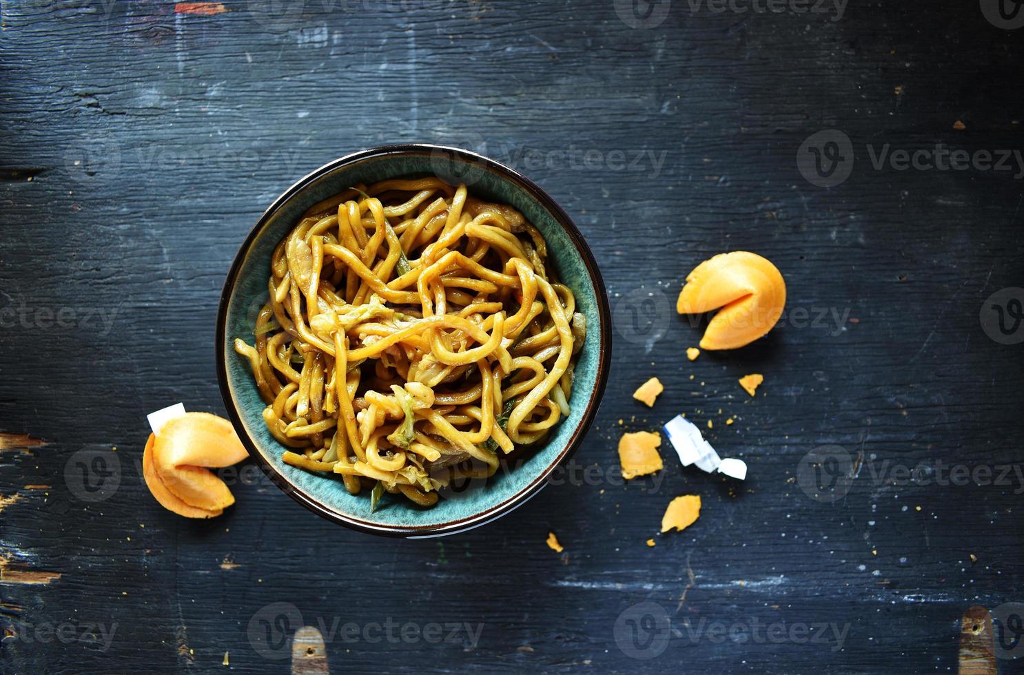 Chinese bowl of lo mein noodles and chop sticks photo