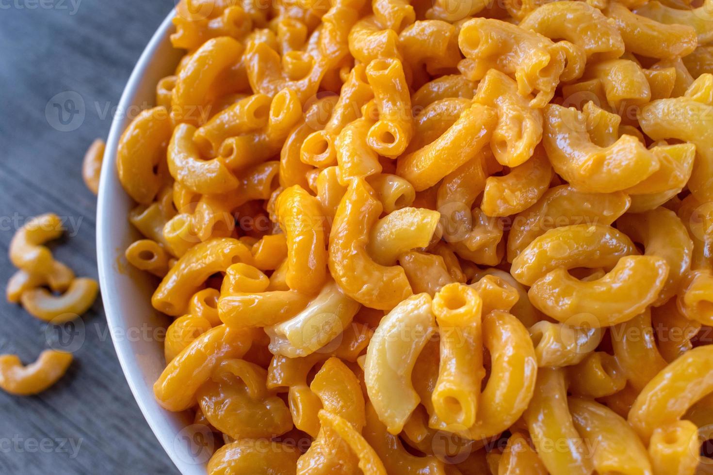 Bowl of macaroni and cheese top down flat lay photo