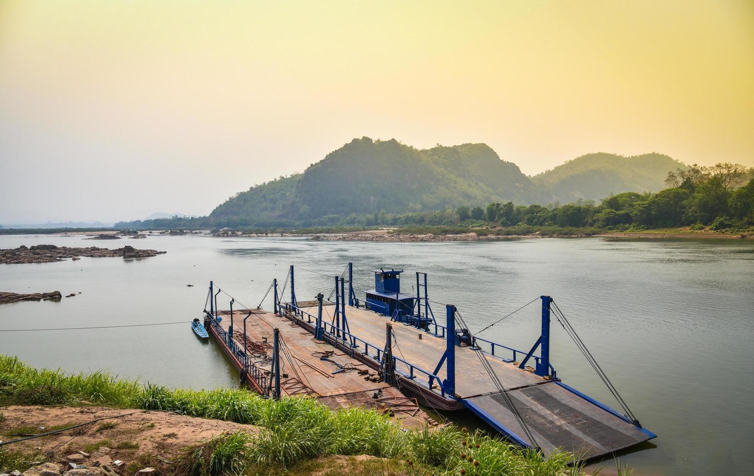 Cargo ship on riverside in the mekong river Asia Boat ferry Thailand and Laos photo