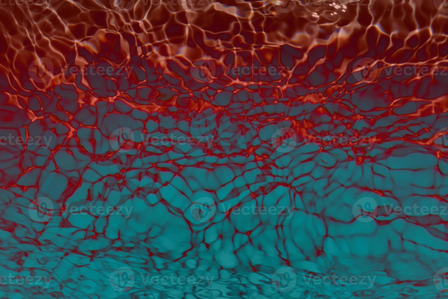 Defocus blurred blue watercolor in swimming pool rippled water detail background. Water splash, water spray background. photo