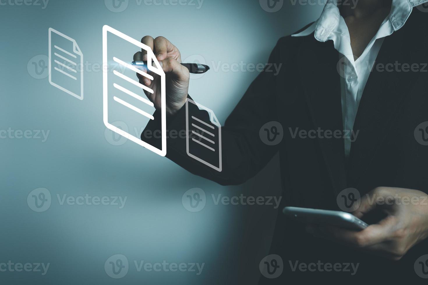 Businesswoman using a pen to sign electronic documents via the Internet, Work from home concept, remote work, new normal office, access to document with secret code or encode, identity verification photo