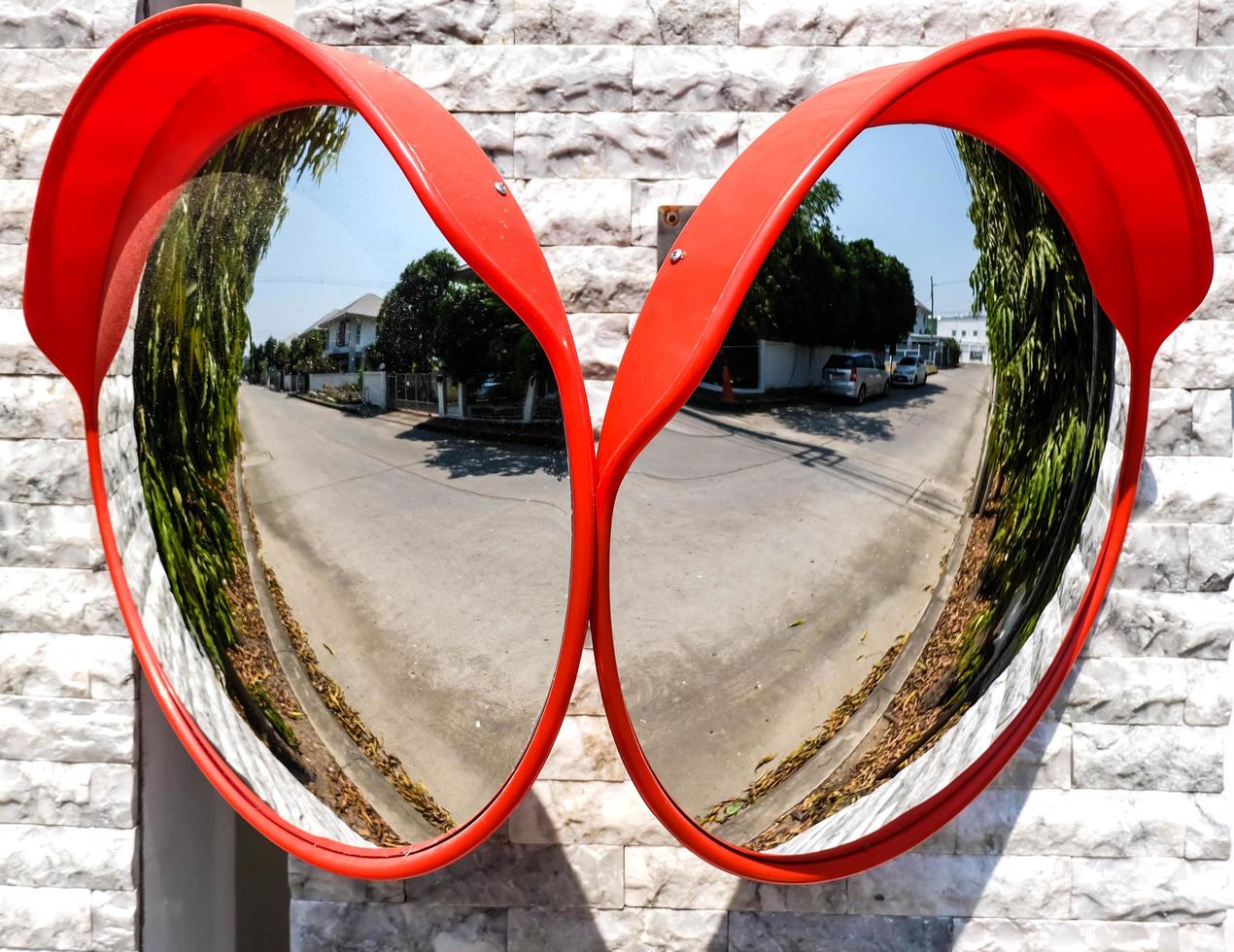 Traffic mirror on the wall at intersection or curve of road, safety and  security concept, close up 8727142 Stock Photo at Vecteezy