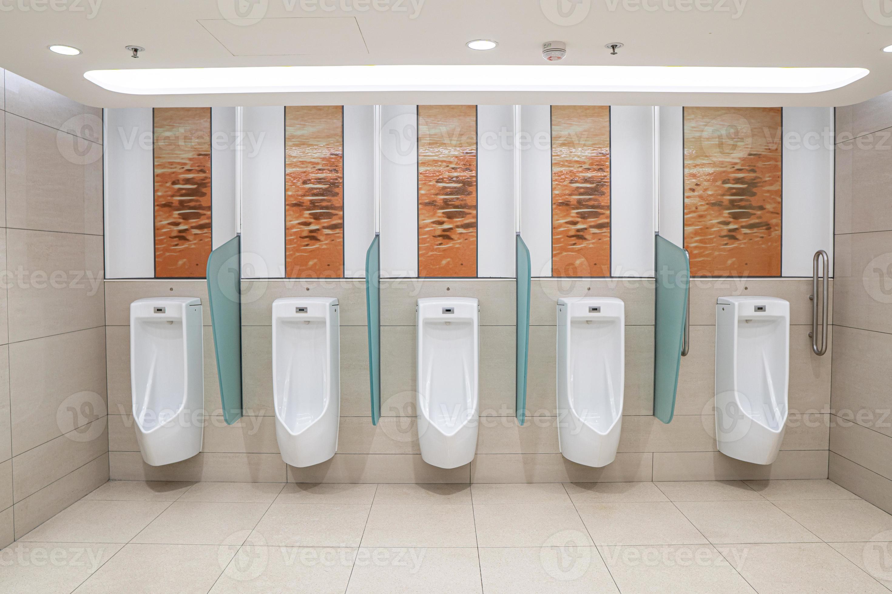 https://static.vecteezy.com/system/resources/previews/008/727/703/large_2x/urinals-men-on-wall-public-toilet-photo.jpg