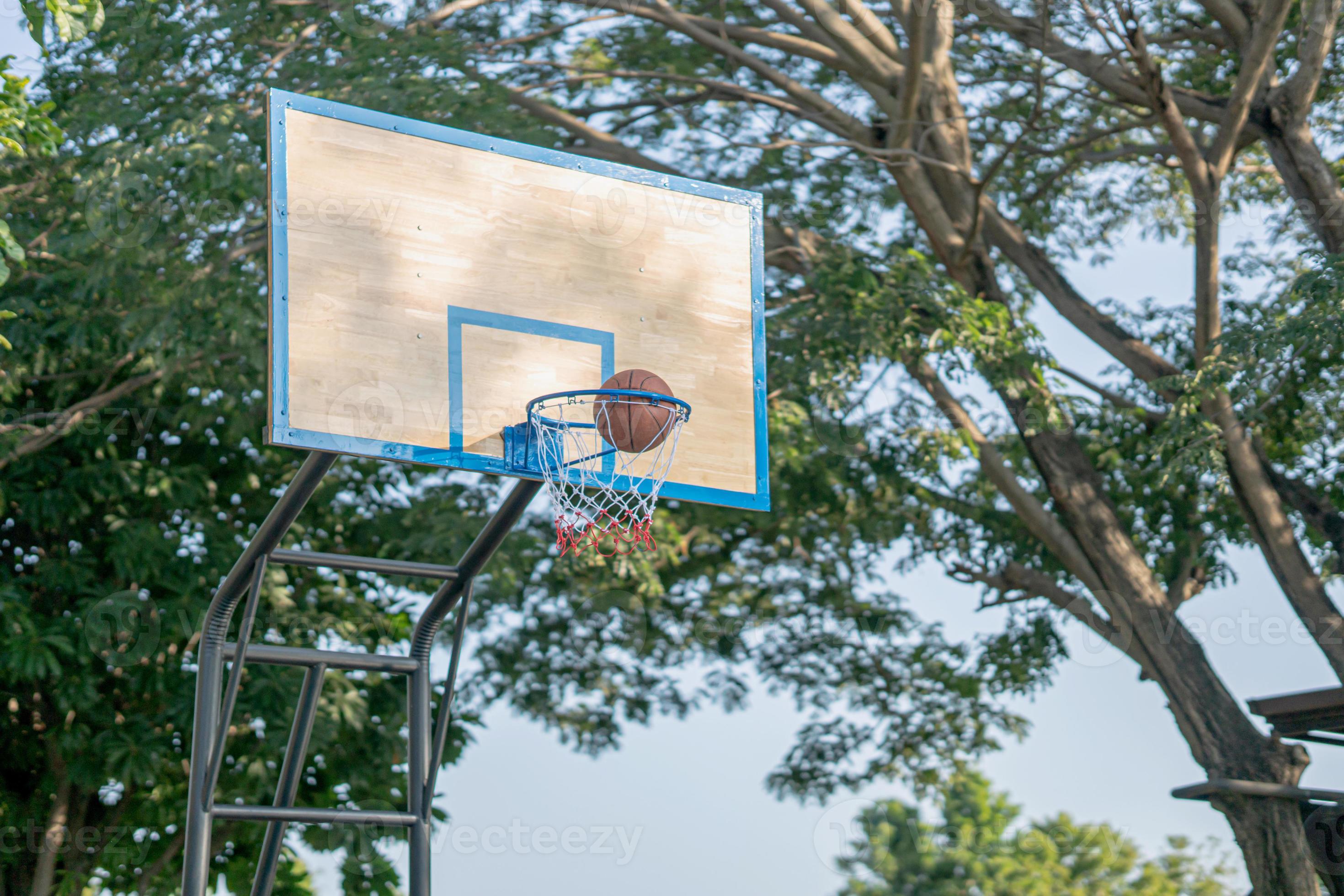 Swish basketball goes through the hoop 8727973 Stock Photo at Vecteezy