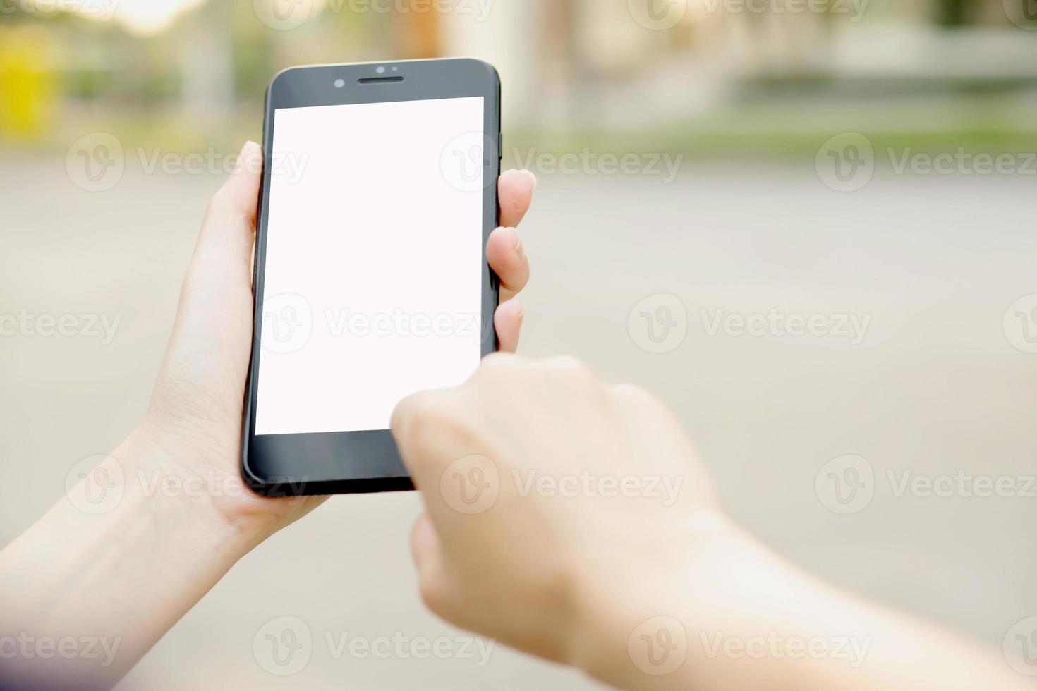 Woman using her Mobile Phone photo