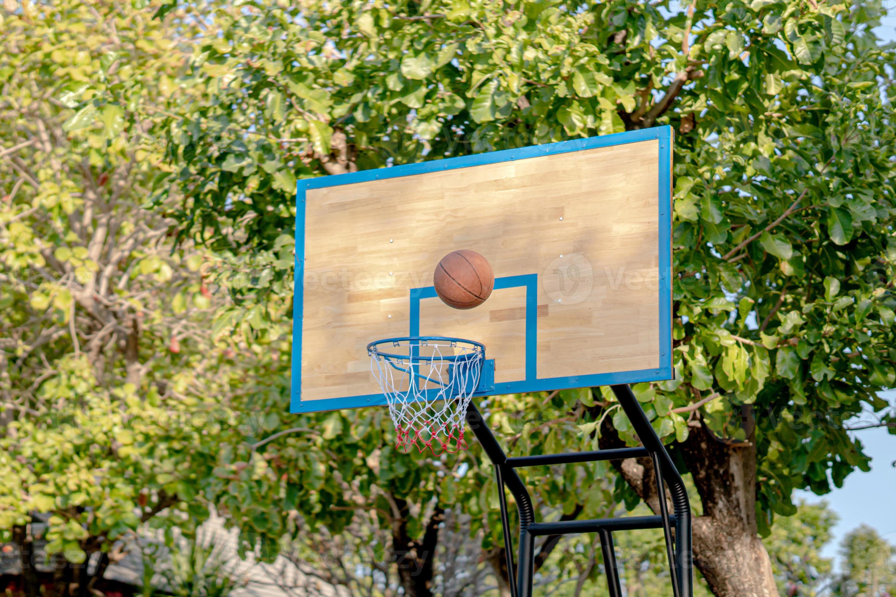 Swish basketball goes through the hoop 8728068 Stock Photo at Vecteezy