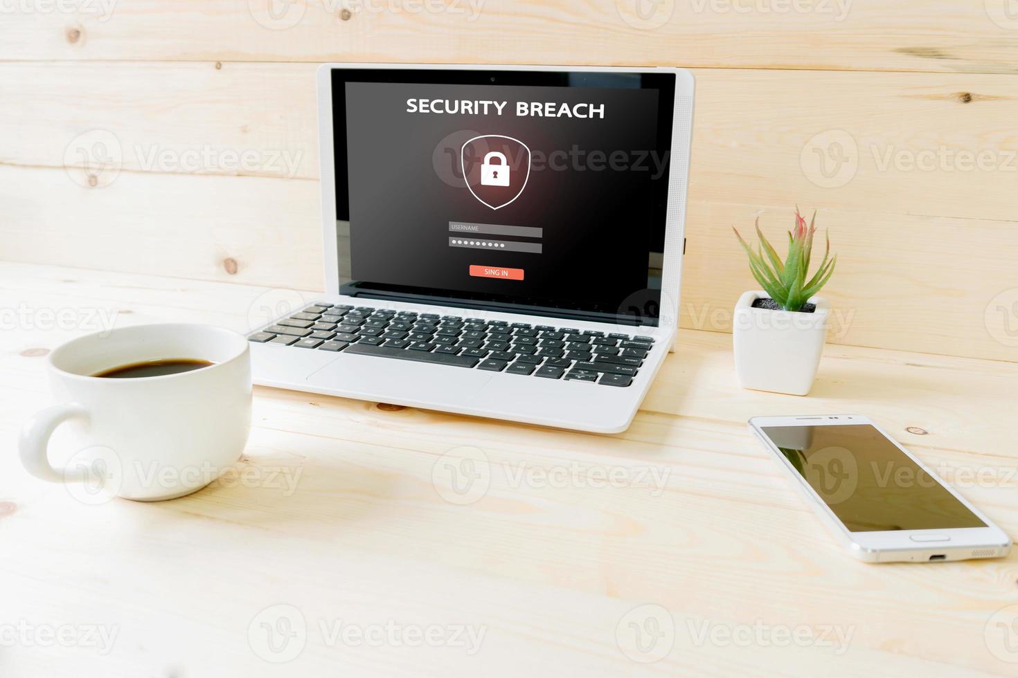 Computer,laptop with blank screen on wood table photo