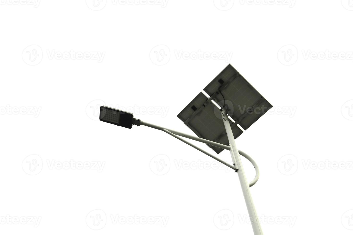 Street light pole with solar panel, eco-friendly alternative energy on white background. photo