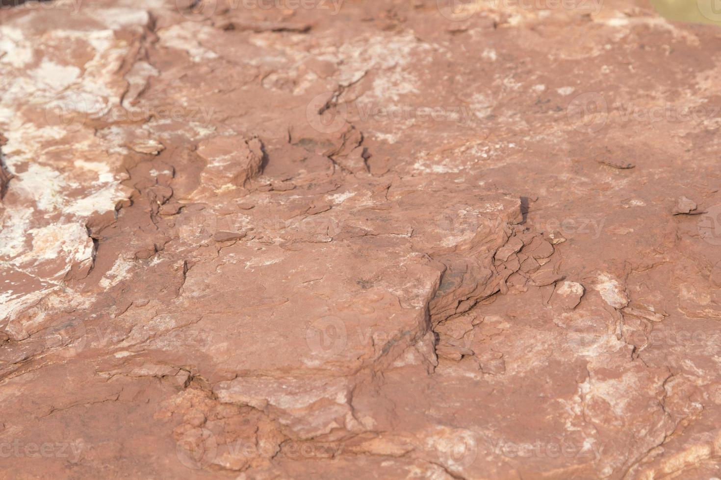 Red sandstone is a large stone used for landscaping, decorating the garden to look natural with man-made and many patterns on the surface. photo