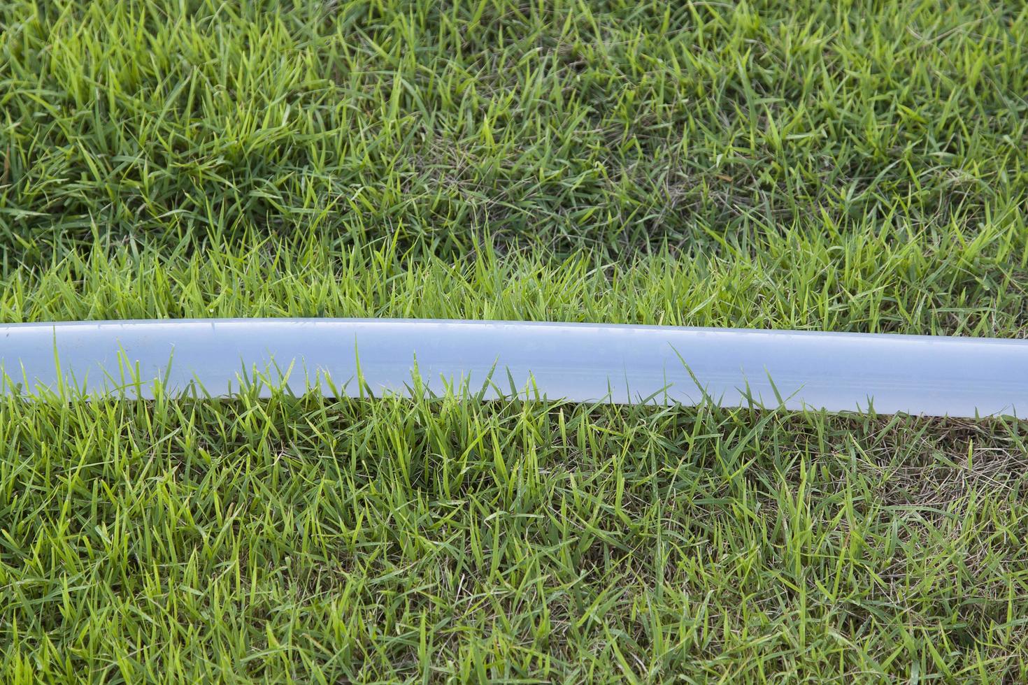 Watering hose is an agricultural tool. photo