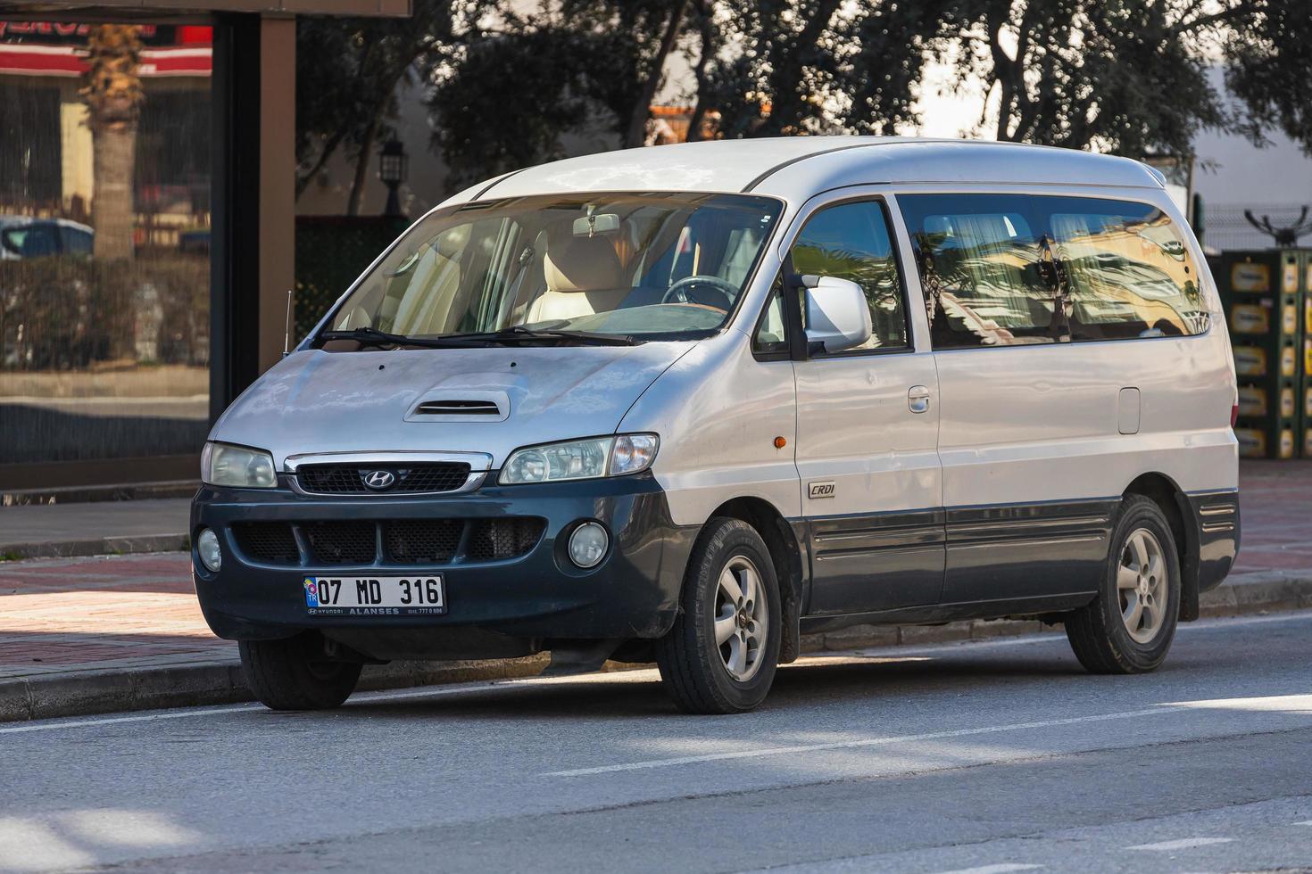 Side Turkey  March 01 2022 silver  Hyundai H 1  is parking  on the street on a  summer day photo