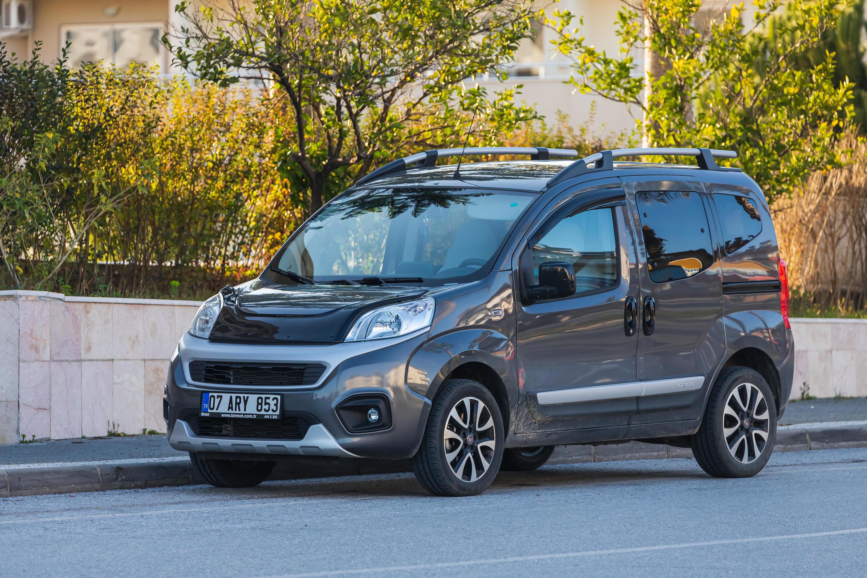 Side Turkey March 01 2022 gray Fiat Fiorino is parking on the street on a  summer day against the backdrop of a shop , park 8729339 Stock Photo at  Vecteezy