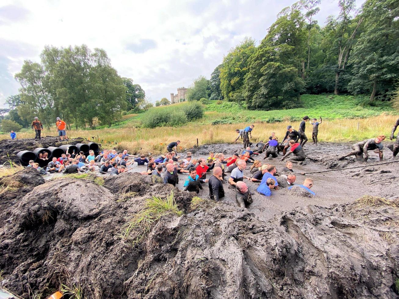 Cholmondeley in Cheshire in the UK in September 2021. Participants in a Tough Mudder event photo