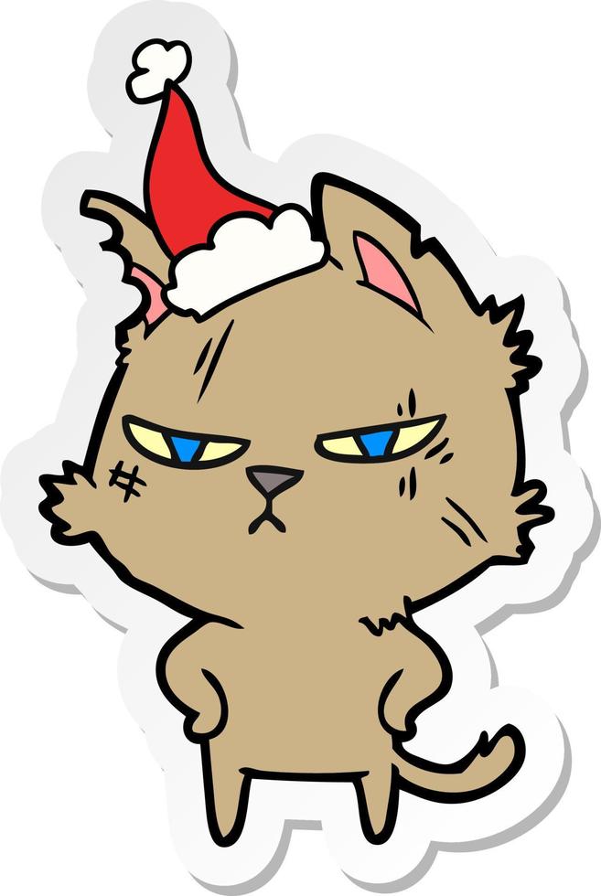 tough sticker cartoon of a cat wearing santa hat vector