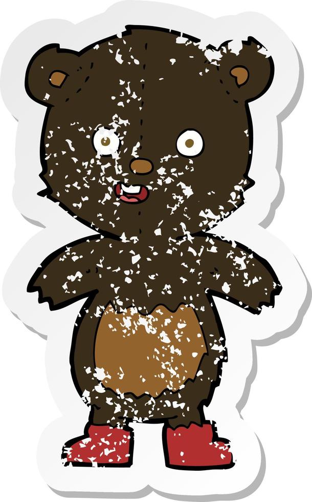 retro distressed sticker of a cartoon happy teddy bear in boots vector