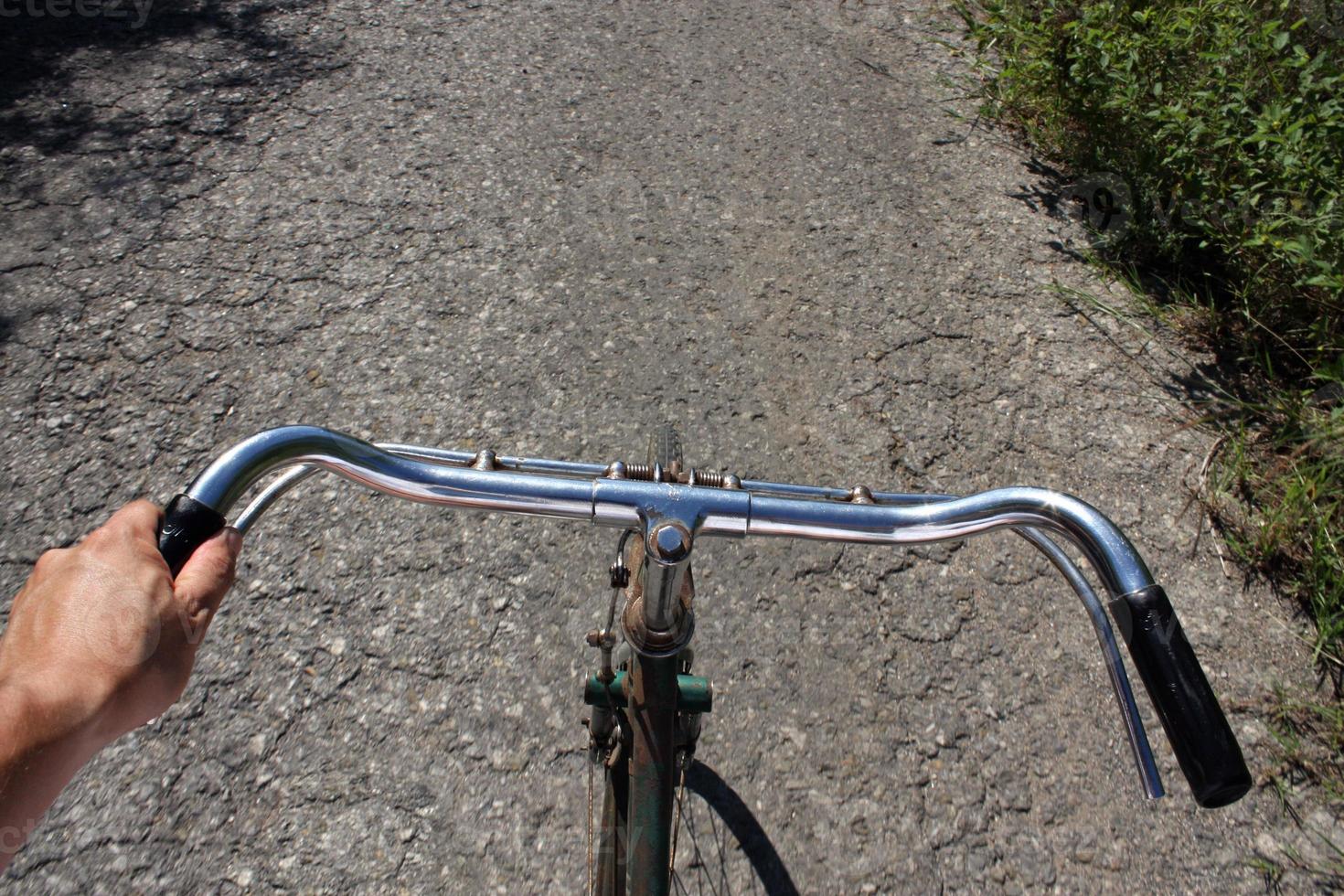 Point of view - Riding an old bicycle photo