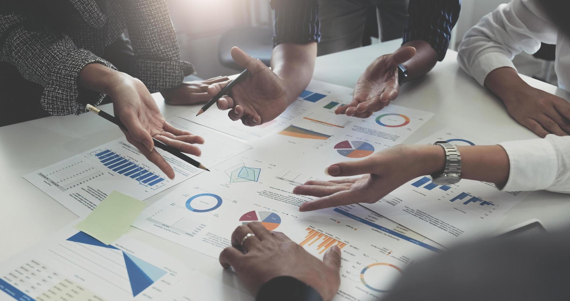 Team of business people working together in the meeting room office, teamwork background charts and graphs banner, double exposure successful teamwork,business planning concept. photo