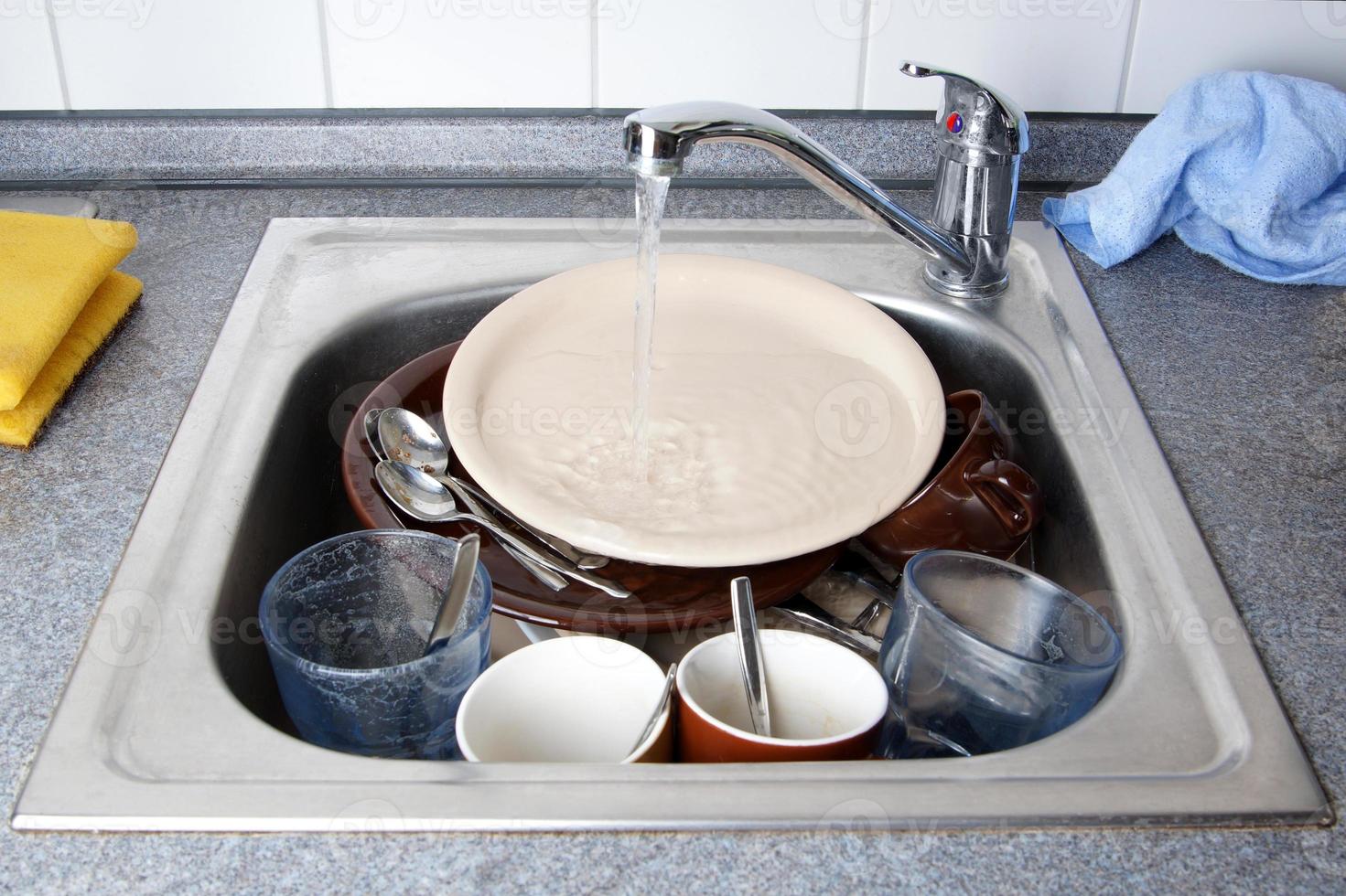 dirty dishes in sink photo