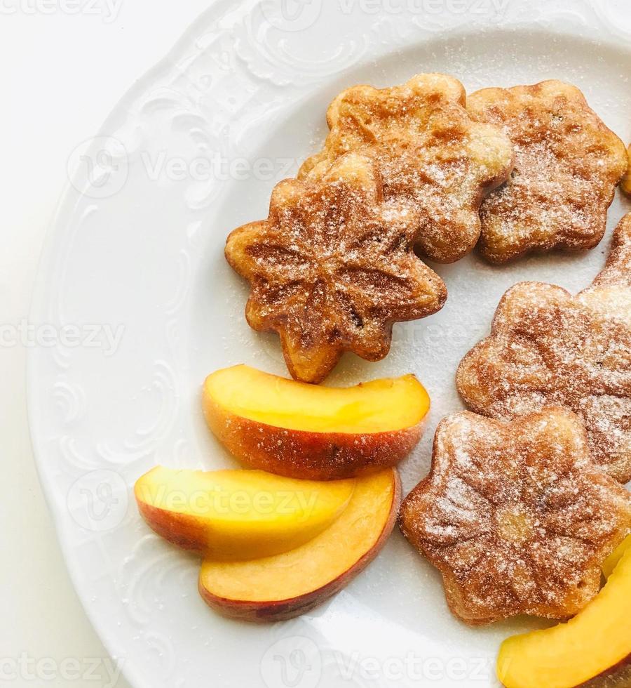 Christmas cookies with ornaments decorated with fruits and berries. photo