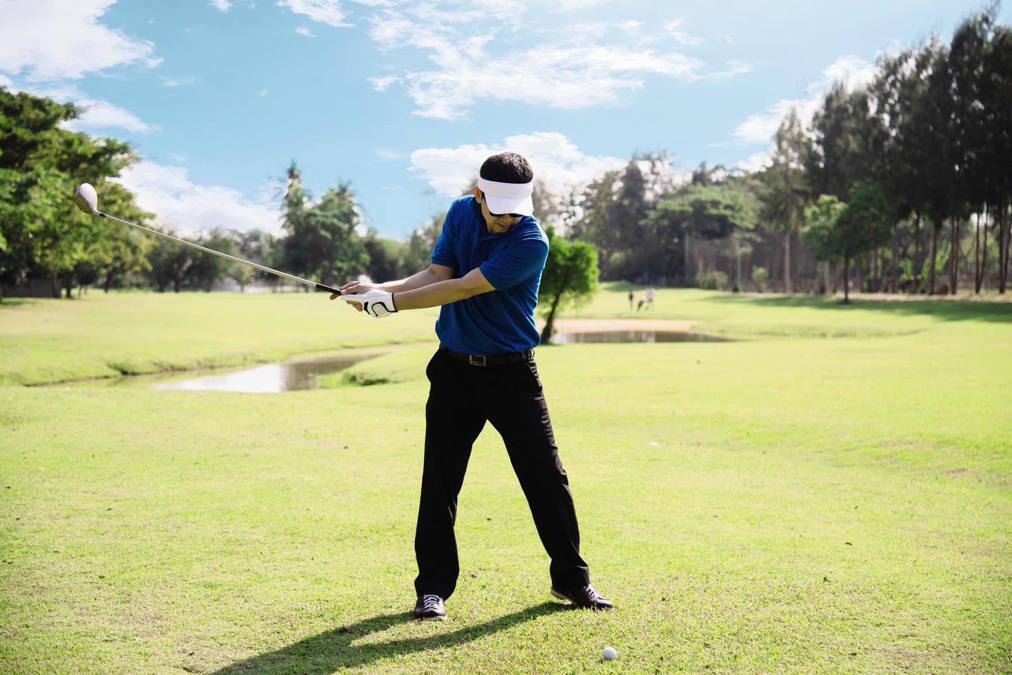 Man play outdoor golf sport activity - people in golf sport concept photo