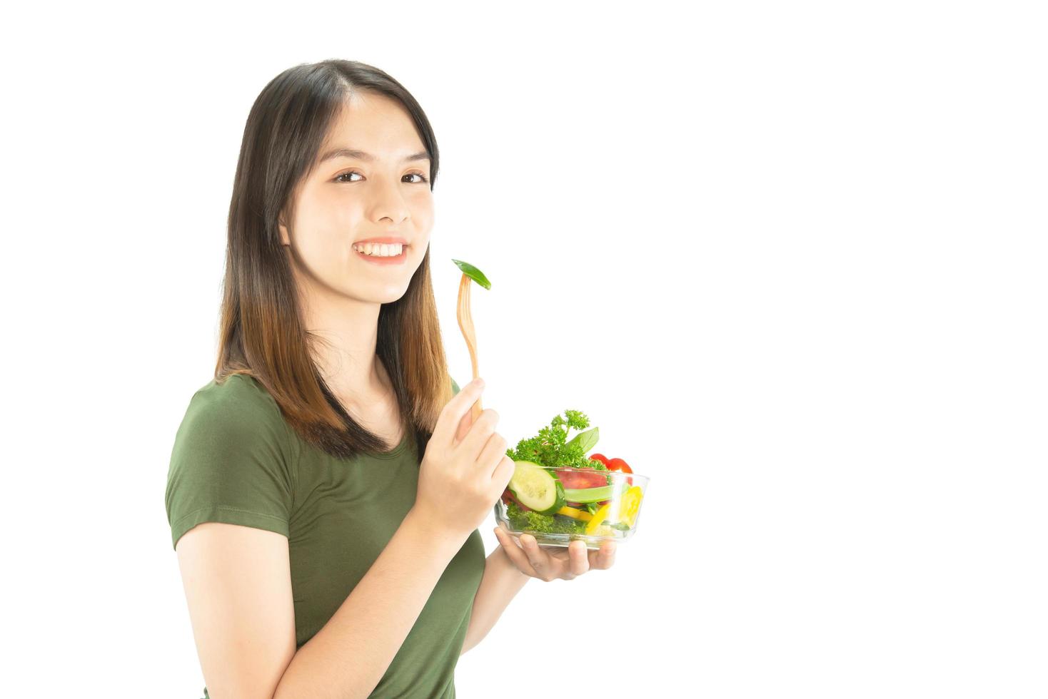 Happy lady holding kichen stuff over copy space background - people home made food preparation concept photo